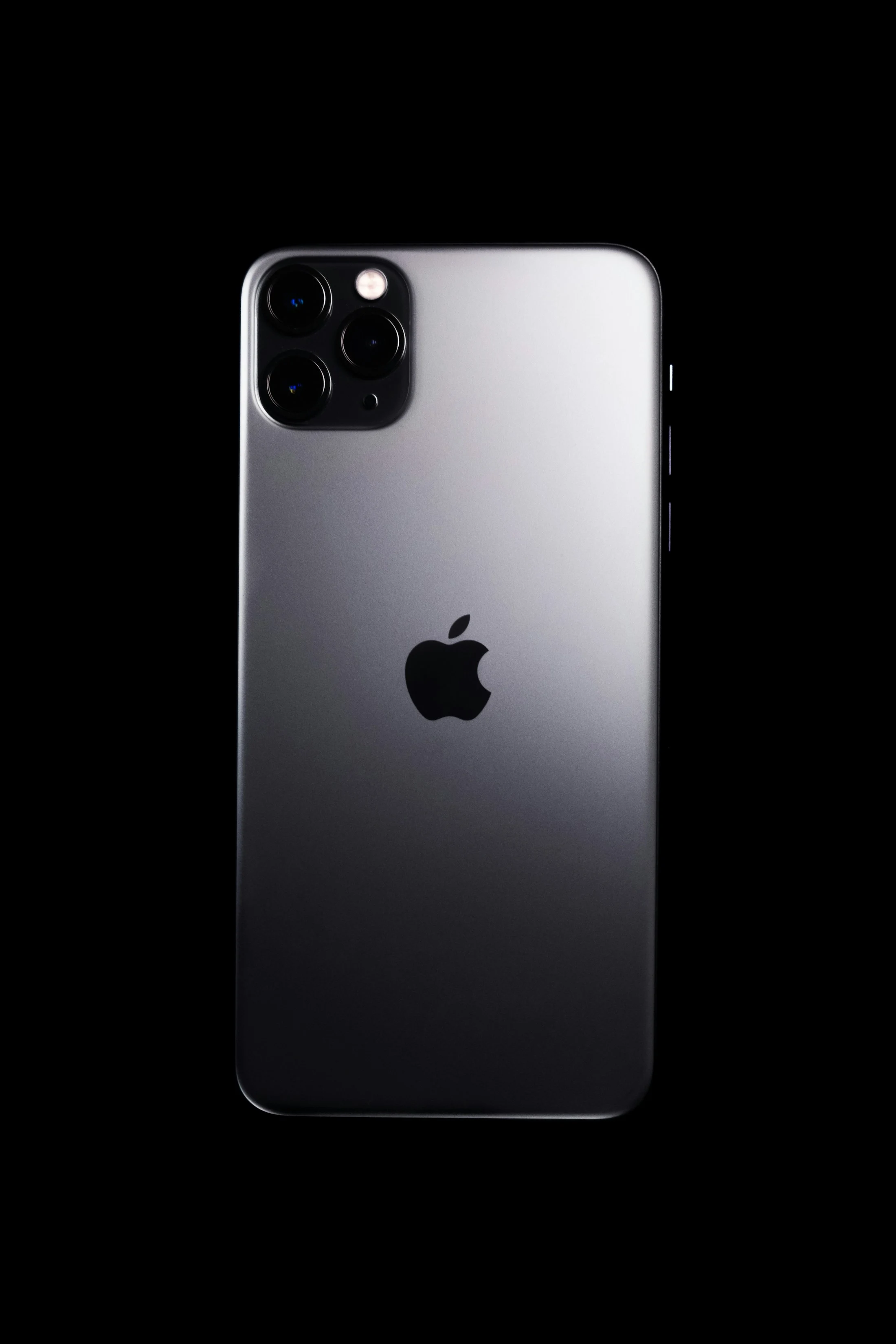 Close-up of the back of a smartphone in soft light